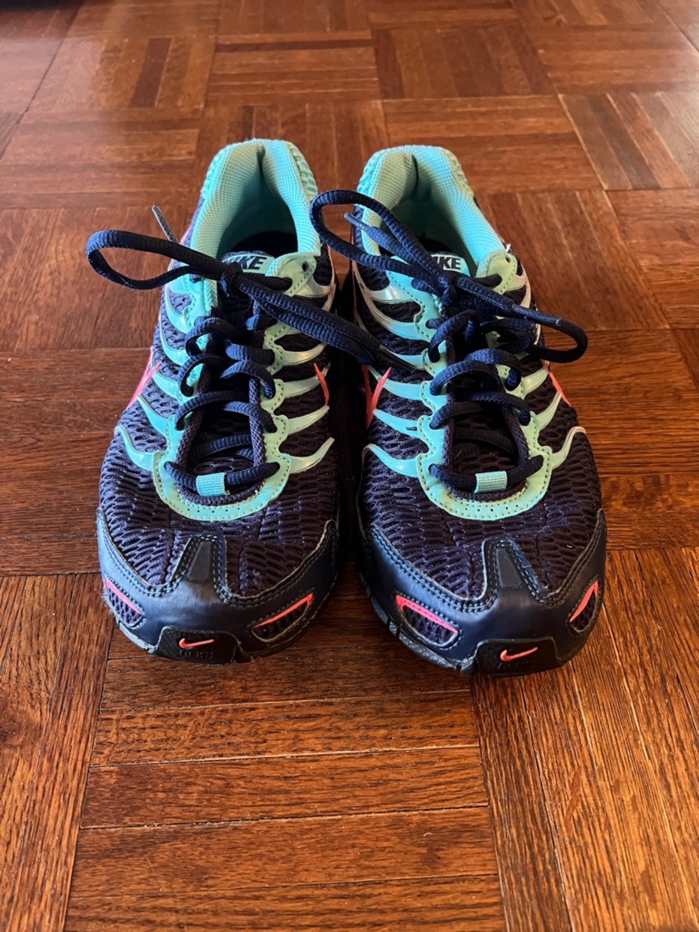 Nike Black Running Sneakers with Teal and Coral Accents